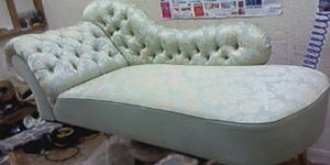 Chaise lounge back to it's former after having it's frame repaired, being traditionally upholstered and <a href=