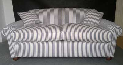 Scroll arm sofa after upholstery covered in an Ian Mankins fabric